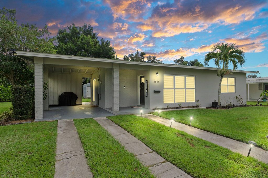 Photo of 2845 SE Treasure Island Road, Port St Lucie, FL 34952 (MLS # R10926656)