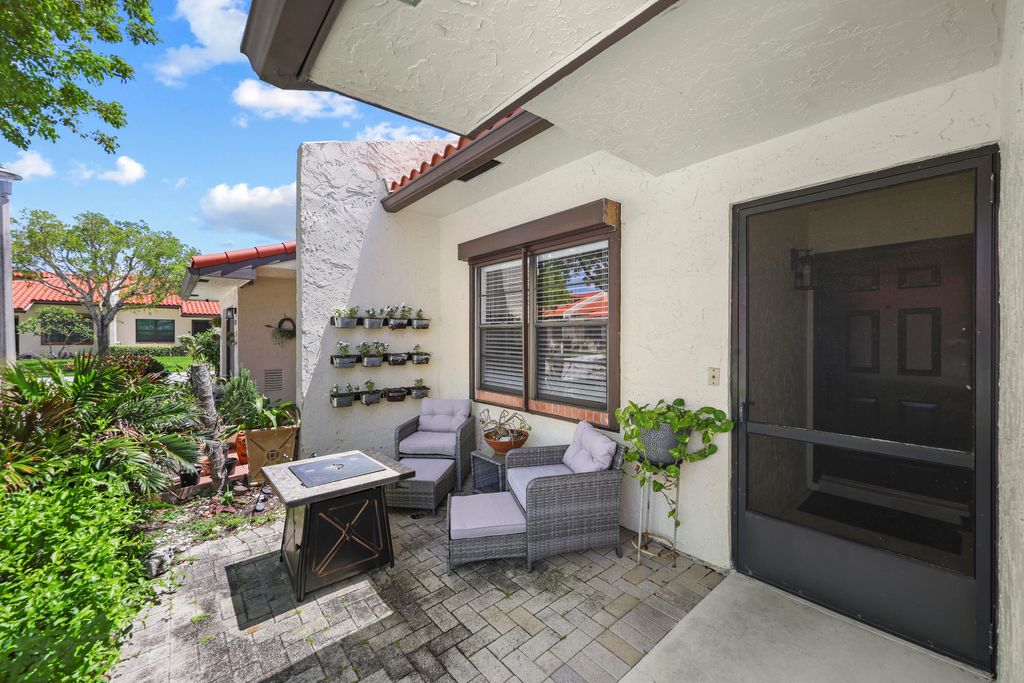 Photo of 39 Bethesda Park Circle #L39, Boynton Beach, FL 33435 (MLS # B26015936)