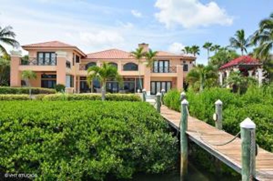 1 of only 9 estate homes located on Isle way in the heart of the exclusive golf, yachting, beach & tennis community of Sailfish Point on Hutchinson Island!  Enjoy expansive water views from this well designed custom Mediterranean style residence.  The spacious interior is adorned with high quality finishes in every room including custom milled moldings, Brazilian Mahogany impact doors & windows & plantation shutters.  Oversized living room with gas fireplace, step down bar, formal dining room, library, den, movie theatre, spacious guest suite with kitchenette & sitting room.  The exterior has abundant lounge areas, numerous balconies, a summer kitchen, pool & private deep water dock.  Sailfish Point is one of the premier private communities in South Florida.  When you own and