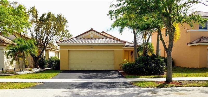 Photo of 1409 Sabal Trail, Weston, FL 33327 (MLS # B26043764)