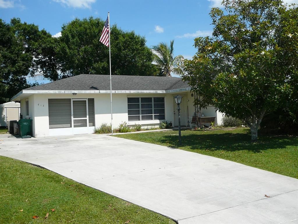 Photo of 413 Poplar Avenue, Port Saint Lucie, FL 34952 (MLS # R10800730)