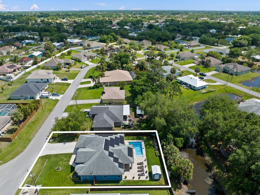 Photo of 1726 SW Bradway Lane, Port Saint Lucie, FL 34953 (MLS # R10971783)