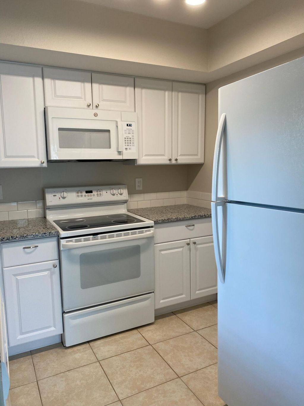 Photo of 1536 SE Royal Green Circle #101, Port Saint Lucie, FL 34952 (MLS # B26014159)