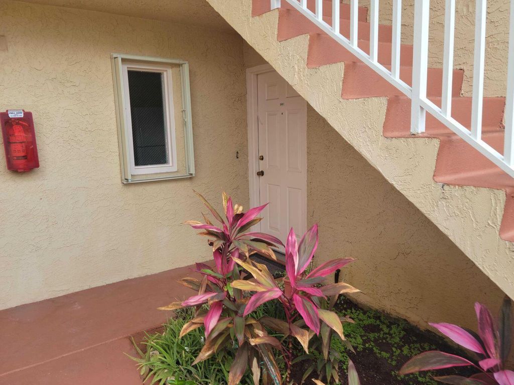 Photo of 1536 SE Royal Green Circle #101, Port Saint Lucie, FL 34952 (MLS # B26014159)