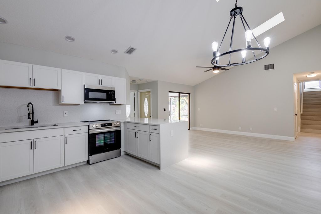 Photo of 12592 Woodmill Drive, Palm Beach Gardens, FL 33418 (MLS # R10989714)