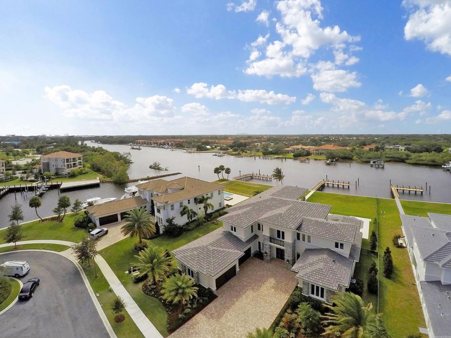 WITHIN THIS PRIZED SETTING IN EXCLUSIVE GATED FRENCHMAN'S HARBOR, LIES A RARE SCOPE OF QUALITY NEW CONSTRUCTION, LUXURIOUS ONE OF A KIND DESIGNER FINISHES AND UNPARALLELED INTRACOASTAL VIEWS. THIS CUSTOM TRANSITIONAL HOME HAS GORGEOUS MARBLE AND WOOD FLOORING THROUGHOUT. AN OPEN GRAND STAIRCASE LEADING TO THE UPPER LEVEL, LARGE WINDOWS THAT INVITE NATURAL BRILLIANCE FROM THE OUTDOORS AND INCREDIBLE VIEWS FROM THE INDOORS. THE GOURMET KITCHEN IS FULLY EQUIPPED FOR THE CULINARY CONNOISSEUR INCLUSIVE OF STATE OF THE ART APPLIANCES. A MOST IMPRESSIVE MASTER SUITE ON THE FIRST FLOOR ENJOYS ITS OWN GLORIOUS INTRACOASTAL VIEWS WITH A SPA LIKE BATH EVOKING SERENITY FROM EVERY PERSPECTIVE.