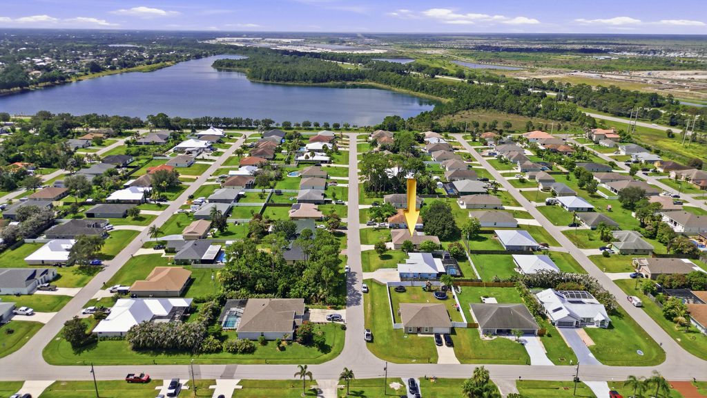 Photo of 3124 SW ARMUCHER Street, Port Saint Lucie, FL 34953 (MLS # B26057641)