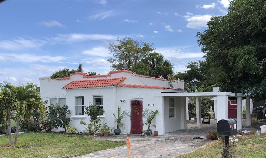 Photo of 824 31st Street St, West Palm Beach, FL 33407 (MLS # R10772230)