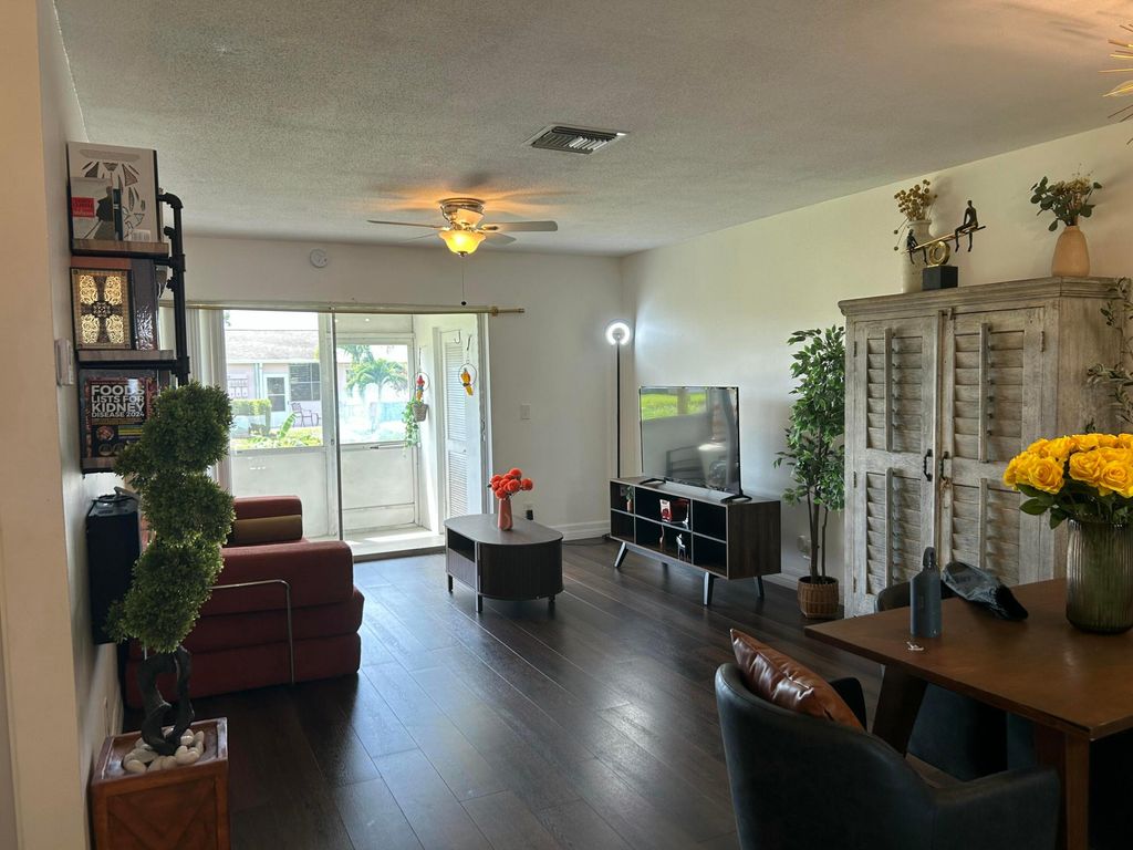 Photo of 2591 W Barkley Dr Drive W #C, West Palm Beach, FL 33415 (MLS # B26025624)