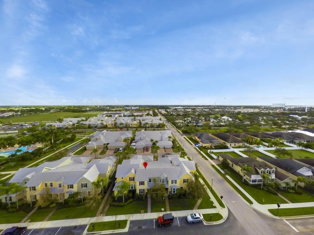 Photo of 10490 SW Waterway Lane, Port Saint Lucie, FL 34987 (MLS # R10969631)