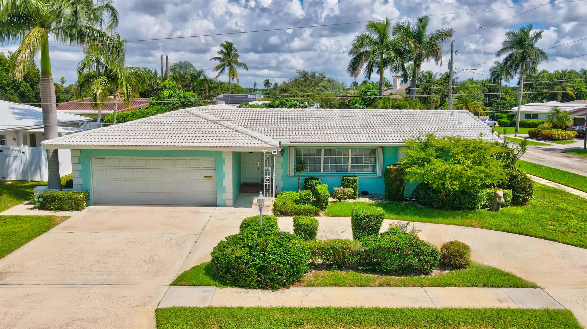 WONDERFUL CORNER-LOT IN A-RATED SCHOOL DISTRICT! ADDISON MIZNER SCHOOL. Split Floor Plan. Oversized 2 car garage.Situated on a spacious corner lot.Home features updated electrical panel, 3 year old AC. Storm-ready with hurricane rated garage door, accordion and panel shutters.