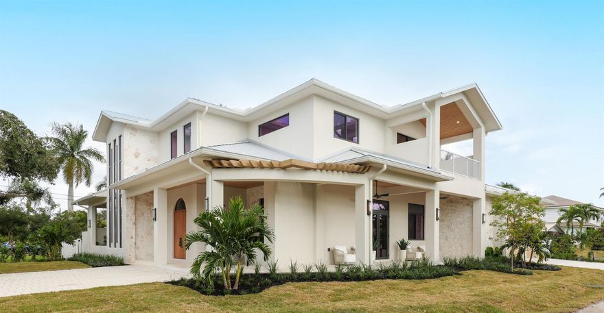 Welcome to Swinton Sands--a brand-new Coastal Modern masterpiece infused with Tulum-inspired serenity, featuring a breezy wrap-around front porch and private balconies off every bedroom. Offering 7,290 total sq. ft., this exceptional residence sits in the heart of Delray Beach on historic N. Swinton Ave--just three blocks from Delray's premier private school and only minutes from the vibrant pulse of Downtown Atlantic Avenue and the soft sands of the Atlantic Ocean. Designed to evoke the effortless elegance of a high-end Tulum retreat, Swinton Sands embraces airy, light-filled interiors, organic textures, soft neutral palettes, and clean modern lines. Expansive custom sliders and an abundance of oversized windows flood the home with natural light, creating a seamless indoor-outdoor