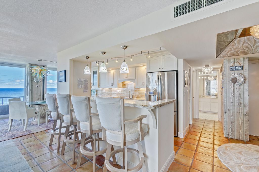 Photo of 5550 N Ocean Drive #12c, Singer Island, FL 33404 (MLS # B26016650)