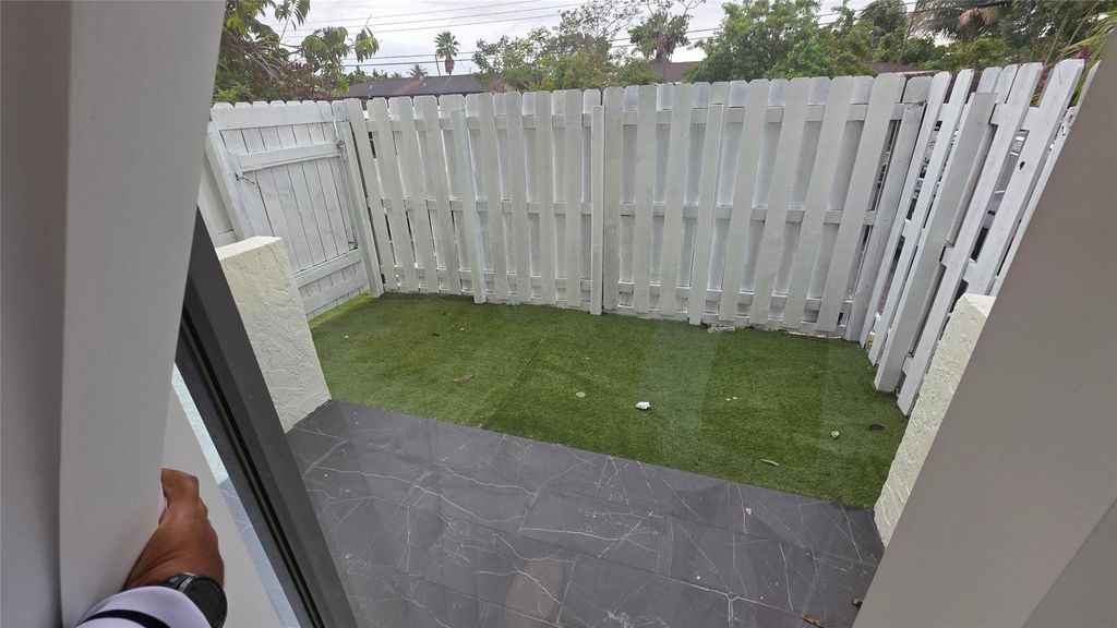 Photo of 1758 NW 55 Ave #101, Lauderhill, FL 33313 (MLS # F10550864)