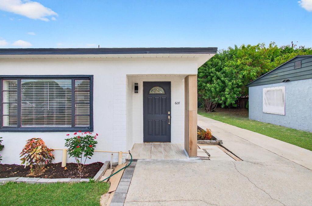 Photo of 608 Fairfax Road, West Palm Beach, FL 33405 (MLS # R11114984)