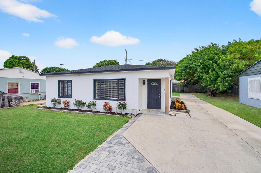 Photo of 608 Fairfax Road, West Palm Beach, FL 33405 (MLS # R11114984)