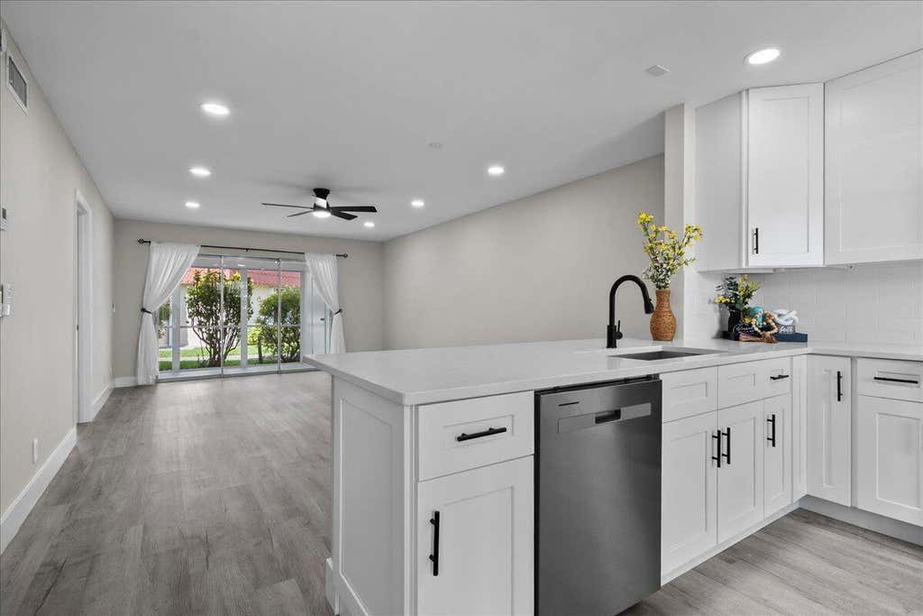 Photo of 539 Franconia Circle #B, Lake Worth, FL 33467 (MLS # B26039565)
