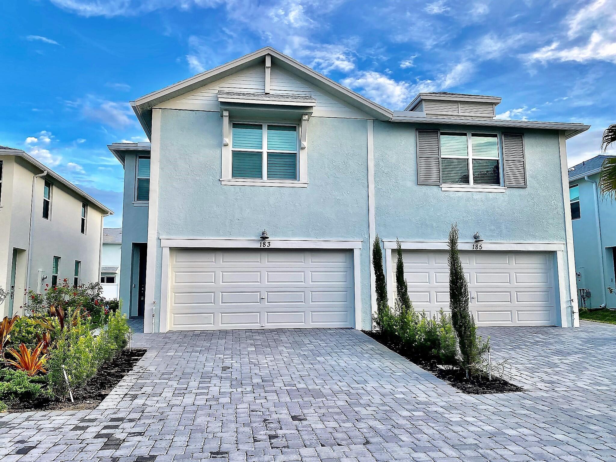 Stunning 3 bedroom, 2 1/2 bath, 2 car garage townhome built in 2022 available for early September move-in! $2700/month for an annual lease or $5000/month for short term stays. Great location in new gated neighborhood with community pool and cabana just minutes from the Treasure Coast's most beautiful beaches, incredible restaurants, Martin County schools, and loads of entertainment in the nearby downtown areas of Stuart and Jensen Beach! Coastal inspired architecture offers the ideal South Florida lifestyle. Well-appointed luxurious kitchen with granite countertops, stainless appliances, and kitchen island with breakfast bar, plush primary suite with walk-in shower, dual vanities, and spacious walk-in closet, hurricane impact windows, plantation shutters and smart features throughout!