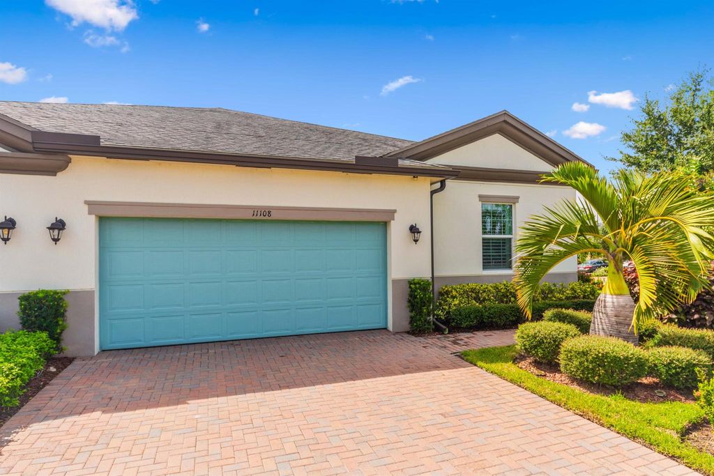 Photo of 11108 SW Sunrise Lake Drive, Port Saint Lucie, FL 34987 (MLS # R11100721)