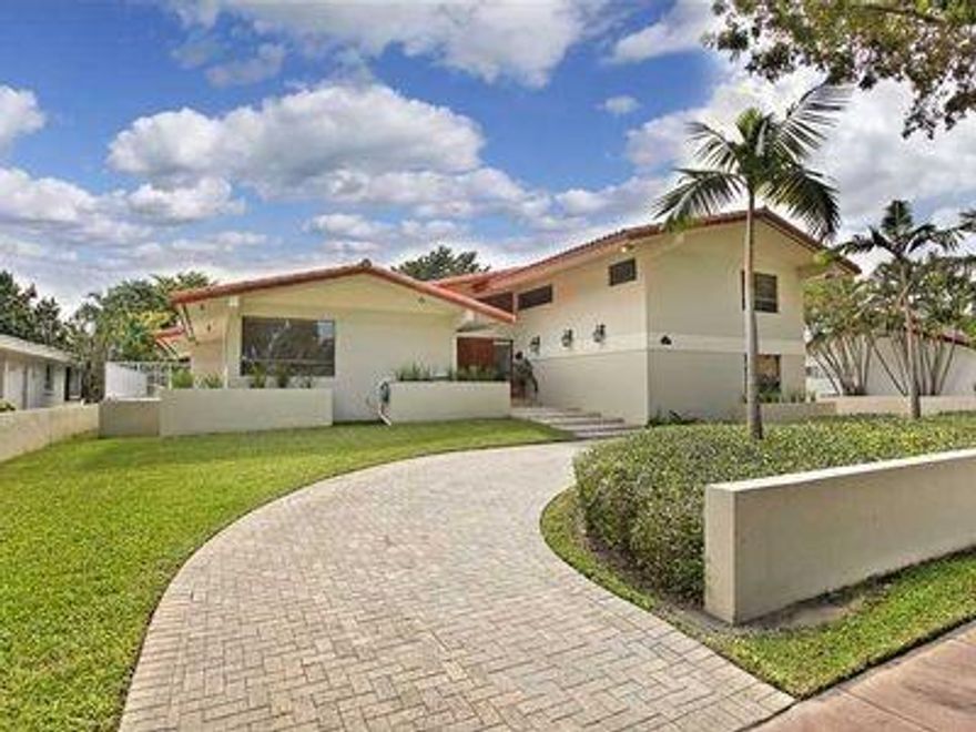 This is an Entertainers home! Walking distance to Granada Golf Course,and Coral Gables Country Club. Home has large freestyle pool,with jacuzzi and spacious patio. Home is on a triple lot 15,000 sq ft All new impact windows and doors throughout. New Roof 2017.