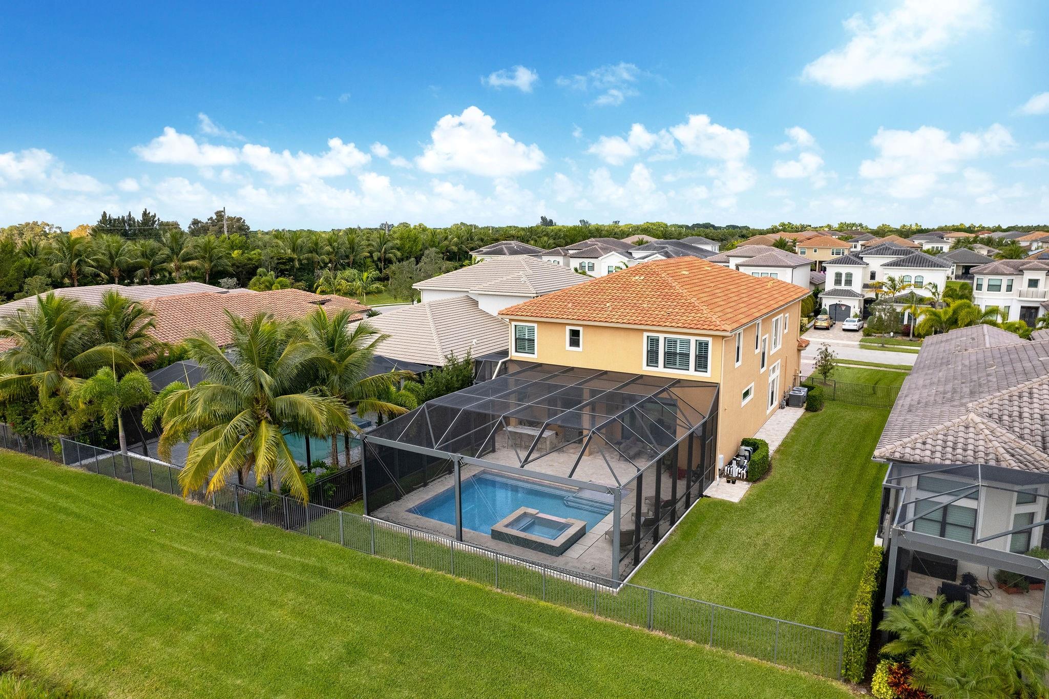 This beautiful home is a Sanibel Model, part of the Pacific Collection located within Seven Bridges. Simple yet elegant design w/ 5BD & 6.5BT, high ceilings 30ft above the living room & 12ft around the rest of the home. Large gray tile on the 1st floor & engineered wood on the stairs & 2nd floor. Upgraded kitchen & Summer Kitchen. Fantastic living room w/ stone wall decoration from floor to ceiling w/ an electric fireplace. Natural light throughout, chandeliers, & multiple built-ins. Huge master w/ sitting area, 2 walk-in closets, a shower & a jacuzzi tub. 4 bedrooms with baths on the 2nd floor & a stunning sitting area for a 2nd family room or office space. Amazing pool, barbecue area, built granite countertop, high pool screen enclosure, jacuzzi, & extended green area on the exterior!