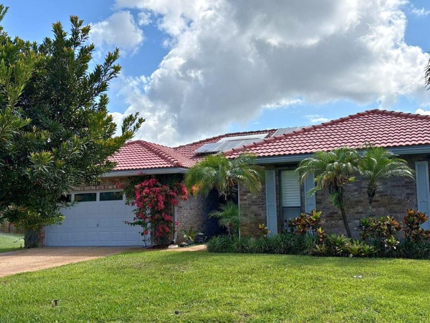 Beautifully updated home in Coral Springs with spacious living and Florida rooms opening to a resurfaced screened pool. Features include granite kitchen countertops, stainless appliances, modern bathrooms, tile and laminate flooring, built-in ceiling speakers throughout, and prewired networking. Energy-efficient upgrades include a 5kW solar electric system, solar water heater, solar and electric pool heaters, and variable-speed pump. Large master with walk-in closet, 2-car garage with attic storage. Located in a quiet cul-de-sac near top-rated schools, Fresh exterior paint, move-in ready!