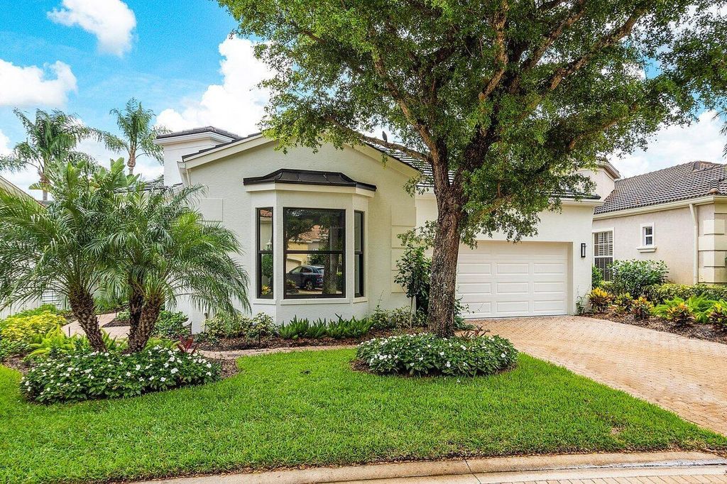 Photo of 319 Sunset Bay Lane, Palm Beach Gardens, FL 33418 (MLS # R10920524)