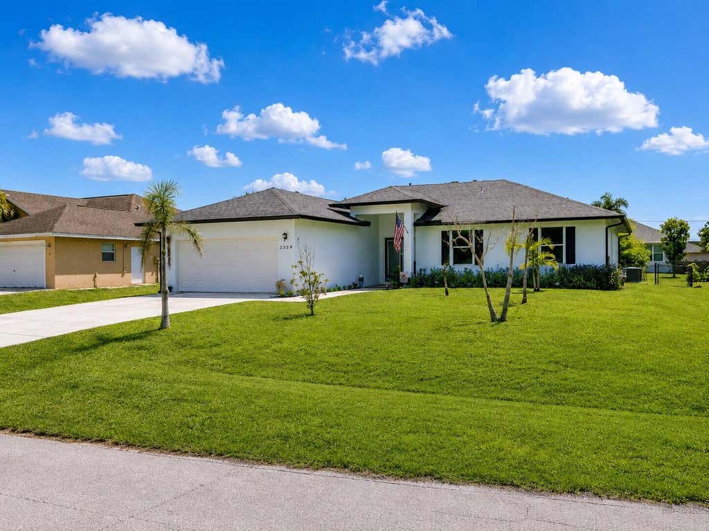 Photo of 2329 SW Mountwell Street, Port Saint Lucie, FL 34984 (MLS # B26069194)