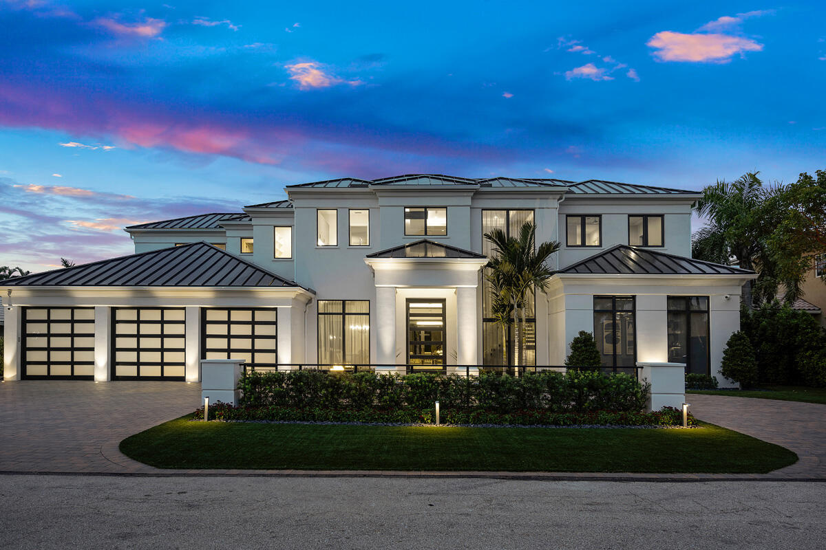 Introducing 1693 Sabal Palm Drive, an extraordinary SRD Signature Estate that embodies modern luxury. Appointed on a rare oversized lot, this residence offers total privacy and serenity. Step outside to the resort-style pool area with a swim-out bench, spa, and two gas fire and water bowls, creating a captivating ambiance. Step into the grand foyer, where oversized custom moldings and volume ceilings create an impressive entrance. The open floor plan showcases a seamless blend of contemporary design elements, including large-format porcelain floors and exquisite wood architecture details. The first-floor owner's suite is a sanctuary of tranquility. Large sliding doors lead to the covered loggia and pool, allowing for seamless indoor-outdoor living.