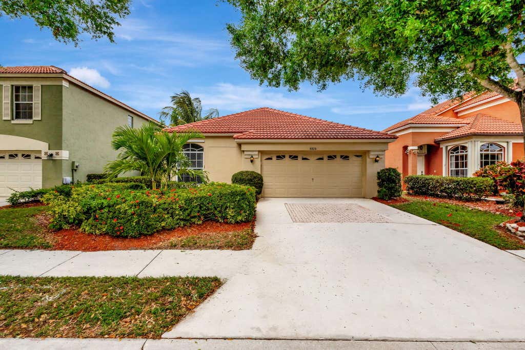 Photo of 4029 Dorado Drive, Riviera Beach, FL 33418 (MLS # R11078360)