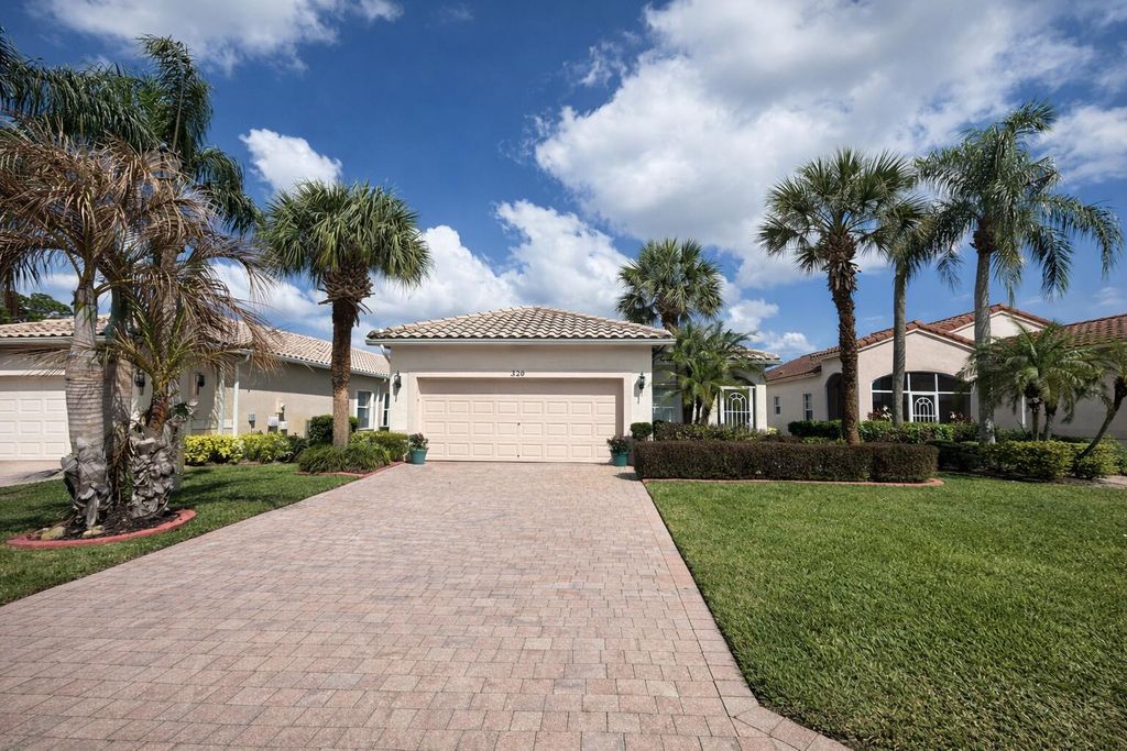 Photo of 320 NW Treeline Trace, Port Saint Lucie, FL 34986 (MLS # B26000938)