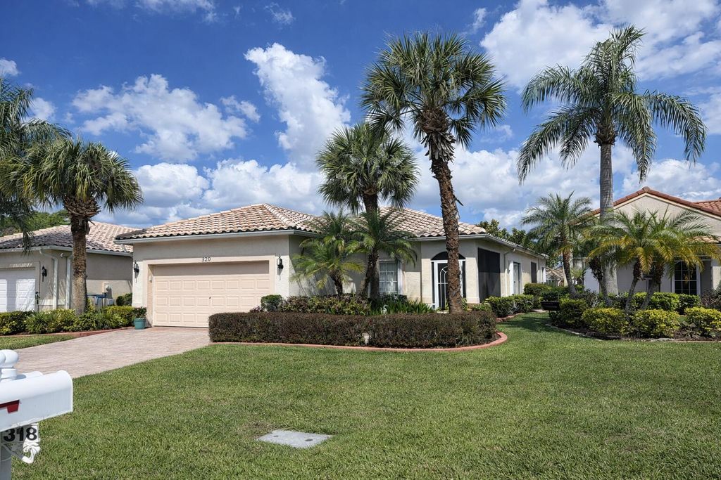 Photo of 320 NW Treeline Trace, Port Saint Lucie, FL 34986 (MLS # B26000938)