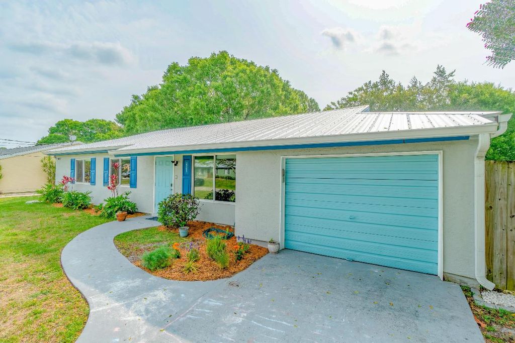 Photo of 2261 SE Aneci Street, Port Saint Lucie, FL 34984 (MLS # R10987782)