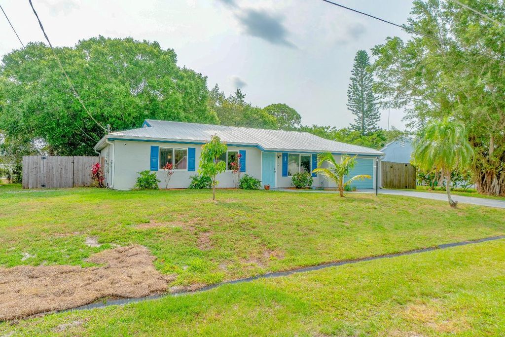 Photo of 2261 SE Aneci Street, Port Saint Lucie, FL 34984 (MLS # R10987782)