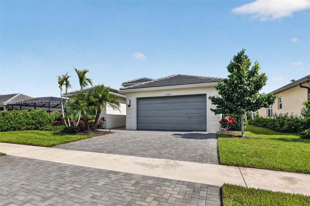 Photo of 11996 SW Seahorse Springs Terrace #0, Port Saint Lucie, FL 34987 (MLS # A12062117)
