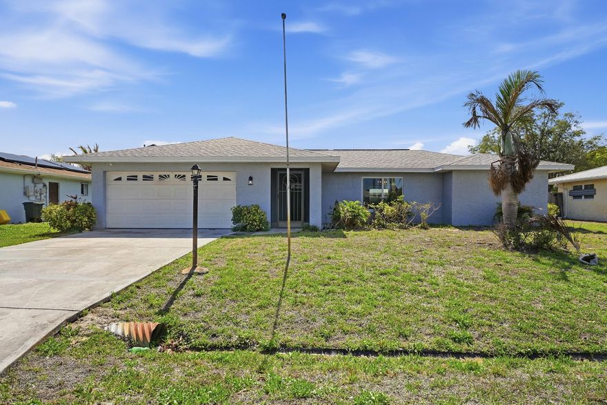 This CBS Pool Home has it All ! Centrally located with easy access to Shopping, Hospital, !/2 block from SE Crowberry Drive and North Fork of the St. Lucie River. Spacious Interior features Large Master Suite, and Huge Family Room Plus a Completely Renovated Kitchen. New Architectural Shingle Roof was Installed in July 2022. Solar powered Electric and New A/C and Hot Water Heater installed July 2022 Too ! Exterior boasts a Large Screened in Pool that was Refinished Plus New Tile in 2024. Oversized Porch Area is Perfect for Entertaining.  WOW New Hurricane Impact Windows Installed in 2025.  Who Could ask for anything more ? Priced to Sell Quickly !  House will be available for showings very soon !