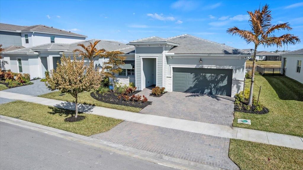 Photo of 14245 SW Britton Avenue, Port Saint Lucie, FL 34987 (MLS # R11163032)