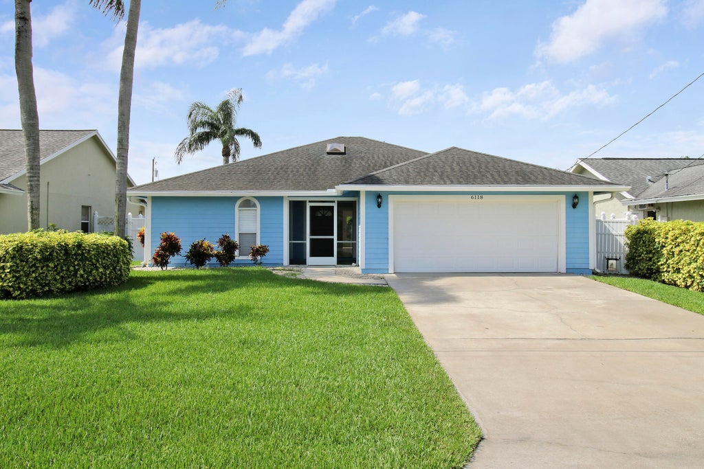 Photo of 6118 Barbara Street, Jupiter, FL 33458 (MLS # B26039288)