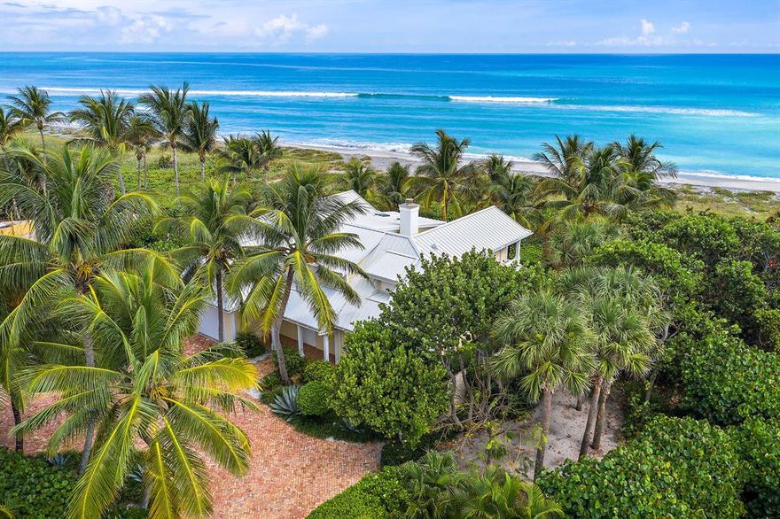 The Best Oceanfront/Beach location on Jupiter Island. Extraordinary custom built oceanfront cottage on just under one half acre with over 101' of ocean frontage.  The two story residence features 3 bedrooms and 4.5 baths in just over 3200 ac/sf with expansive ocean views from all living areas and from every bedroom.  The open floorplan offers the ability to have upstairs and downstairs master suites.  The downstairs master has an oceanfront sitting room/Florida room with both screening and impact glass while the upstairs master enjoys a large oceanfront balcony.  The current owners went to extraordinary lengths in the design and construction of this residence to insure that only upper tier materials and the highest level of fit and finish were used throughout.
Full house backup generator. and in adherence with the highest hurricane protective standards by D&D Constantakos, Inc.  The home offers an air conditioned single car garage but also features an expansive Chicago Brick driveway which can easily accommodate multiple vehicles. The home has been meticulously maintained and shows like a brand new residence.