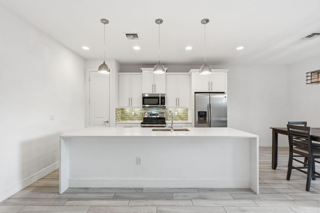 Photo of 3193 Santa Catalina Place, Greenacres, FL 33467 (MLS # B26005254)