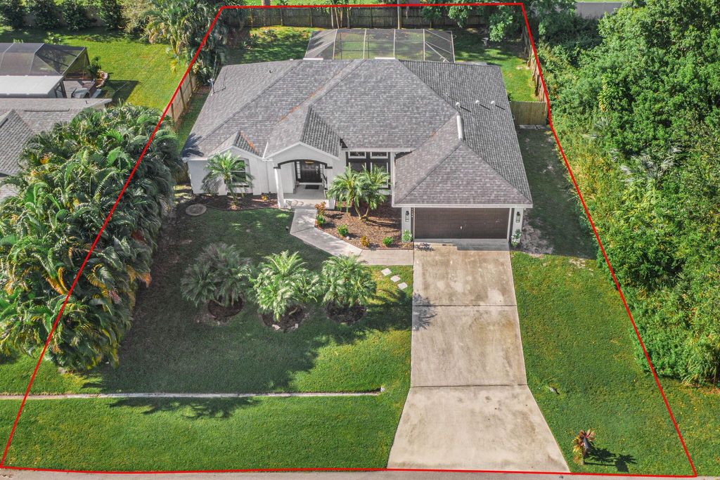 Photo of 1158 SW London Ln, Port Saint Lucie, FL 34953 (MLS # R10920803)