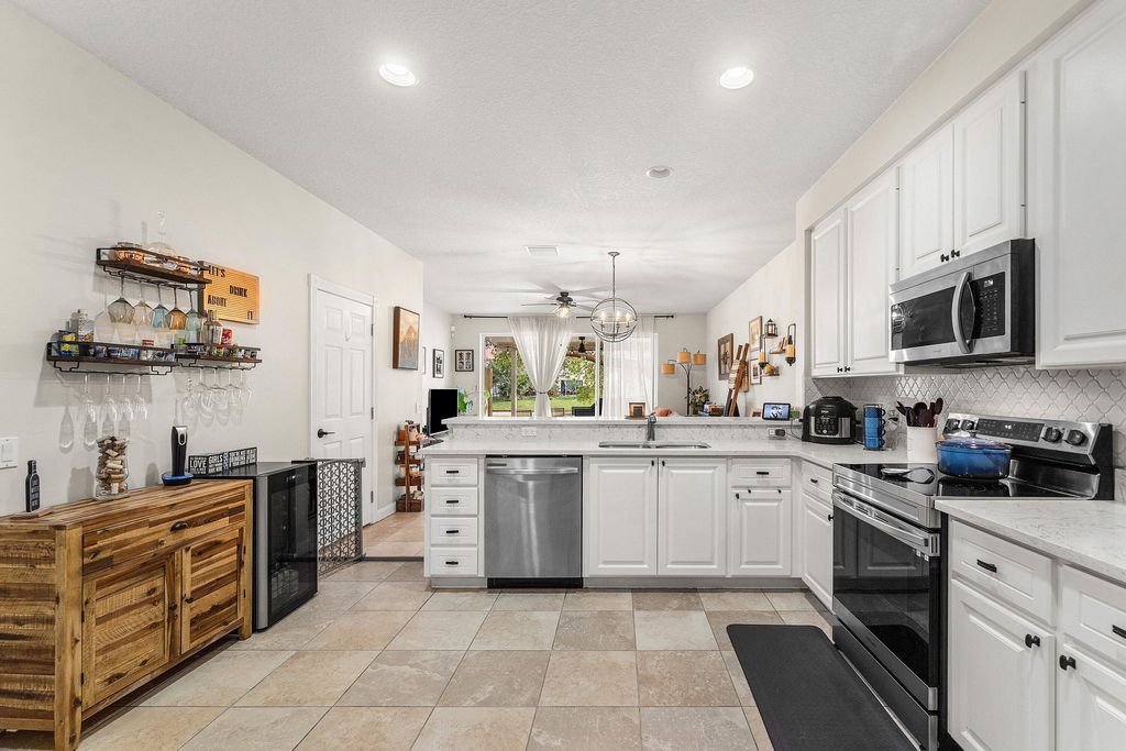 Photo of 1094 Pinewood Lake Court, Greenacres, FL 33415 (MLS # B26003293)