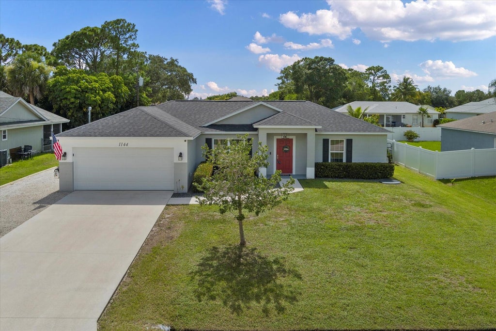 Photo of 1144 SW Irving Street, Port Saint Lucie, FL 34983 (MLS # R11003294)