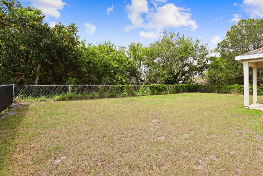 This Beautiful and functional designer home was build by D.R Horton in 2019 , This is a 4 Bedroom and 2 Bathroom , 2 Car Garage home on .23 Acres with a fully fenced back yard with plenty of room to build a pool . A spacious family room to expand to a casual dining area and an open Island kitchen for family .a great space to entertain lots of guests. Plenty of parking space . Home comes with impact windows and shuttles. Close to Turnpike and I-95   Shopping , and both Orlando and Palm beach Airports , Don’t miss this opportunity come see this beautiful.