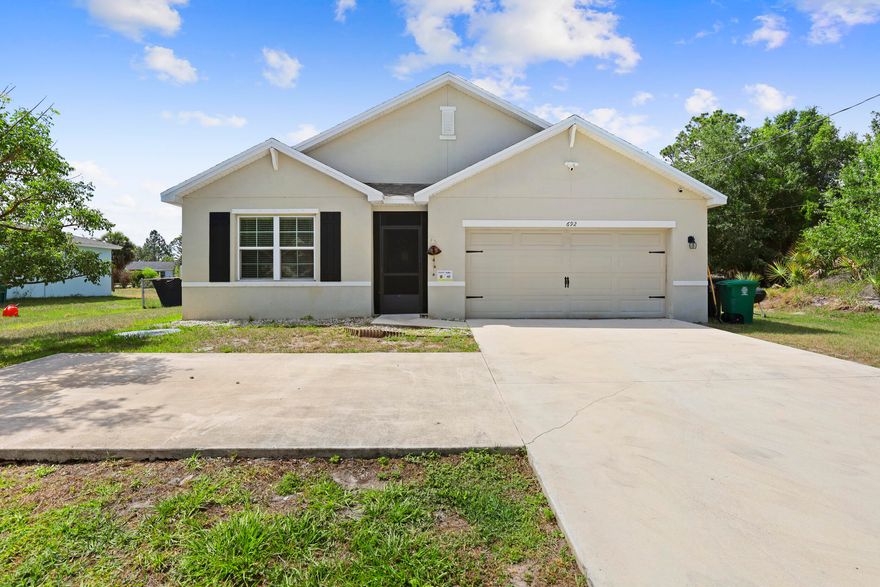 This Beautiful and functional designer home was build by D.R Horton in 2019 , This is a 4 Bedroom and 2 Bathroom , 2 Car Garage home on .23 Acres with a fully fenced back yard with plenty of room to build a pool . A spacious family room to expand to a casual dining area and an open Island kitchen for family .a great space to entertain lots of guests. Plenty of parking space . Home comes with impact windows and shuttles. Close to Turnpike and I-95   Shopping , and both Orlando and Palm beach Airports , Don’t miss this opportunity come see this beautiful.