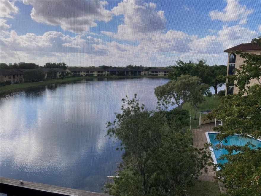 Corner unit, Imamaculately Kept, Furnished and Newly painted,Beautiful Lake front view from balcony, Bedroom and Living Room. All remodeled W/ new A/C, Hot Water heater,Dish washer and Toilets. Big bedroom W/Walkin Closet. Open kichen,  dinning area, Large living room. The community is close to the Saw Grass Mall, Saw Grass Express way, Oakland Park Blvd, on Nob Hill.