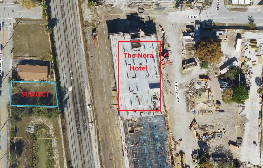 Vacant mixed use lot with zoning allowing for up to f-stories.  This lot is south of PB Lakes Boulevard on North Rosemary Avenue, which is a high-growth downtown area.
