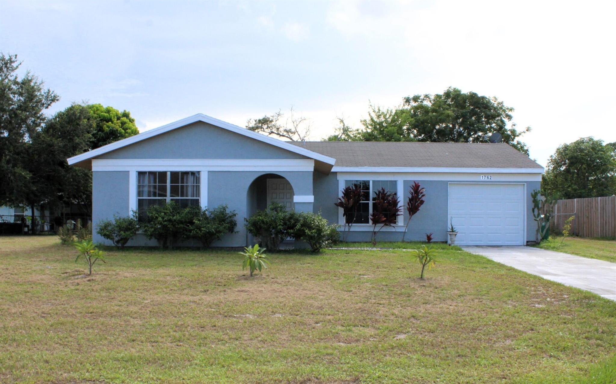 Charming 2-bedroom 2 bath rental home, located in a quiet neighborhood near shopping, restaurants, parks and beaches. Features include tile throughout, a spacious yard, and extra room that could be used as an office. Washer and dryer included. Move in requirements are 1st and last month's rent plus security deposit, good credit and 2 1/2-3X the rent in verifiable income.