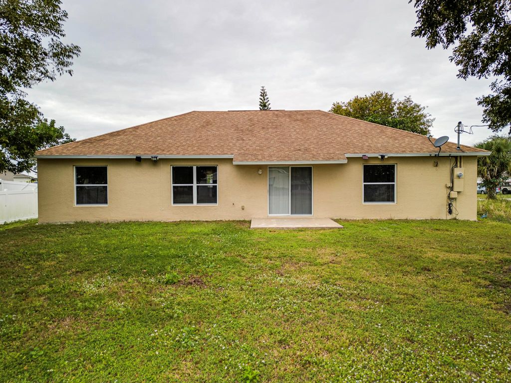 Photo of 671 SW Addie Street, Port Saint Lucie, FL 34983 (MLS # R10944479)