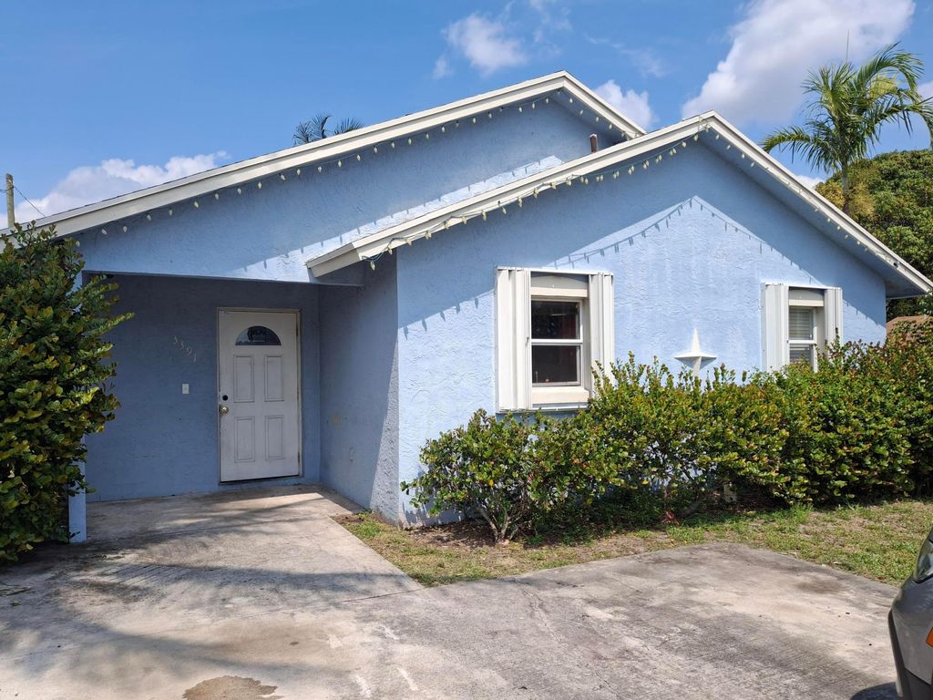 Photo of 3391 Avenue, Riviera Beach, FL 33404 (MLS # B26023675)
